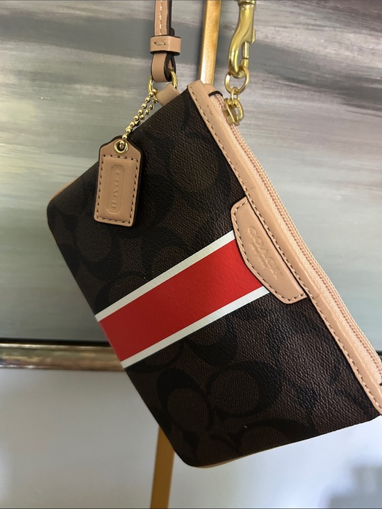Coach Handbags - Coach Brown Signature Stripe Wristlet with Orange and White Accent Hang Tag